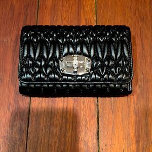 miu miu
Matelasse Crystal Compact Bi Fold Wallet